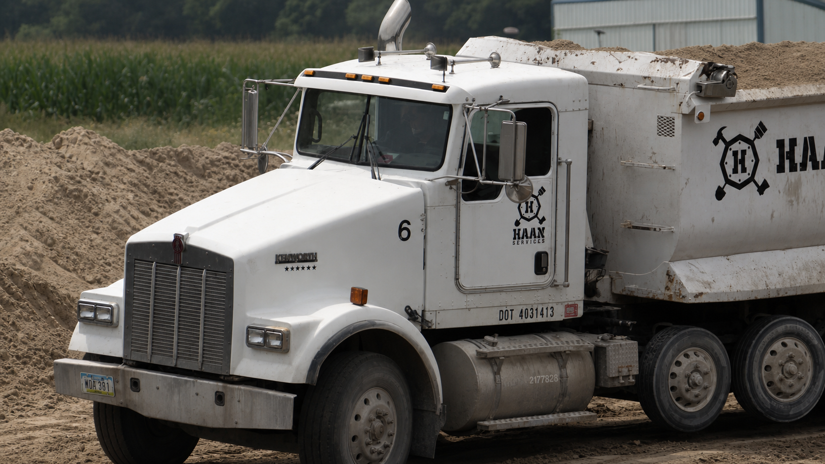 Truck being loaded with foundry by-product material